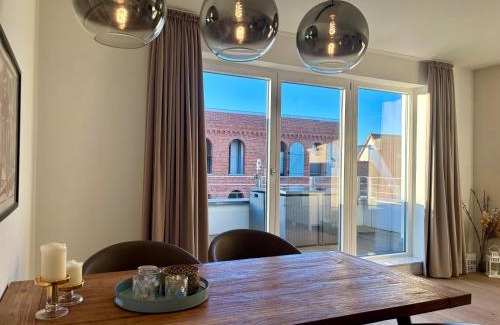 Eckernfoerde Apartamento | Ferienwohnung "JungfernEcke" mit Sauna, Hafenspitze Quartier