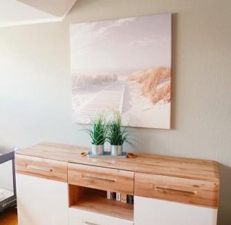 Neuharlingersiel Apartamento | Ferienwohnung KÖÖK II - Der Strand ist zum greifen nah.