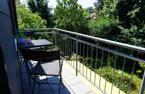 Gifhorn Condominio | Ferienwohnung Kochel, 44 qm, mit Wohn-/schlafraum, Balkon mit Blick in Garten