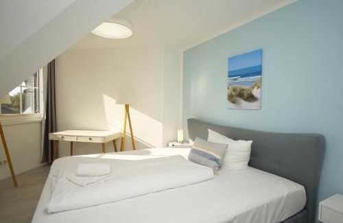 Gross Zicker Apartamento | Ferienwohnung mit Balkon, gratis Sauna- und Schwimmbadnutzung im AHOI in Sellin - Haus Inselwind FeWo MEERsonne