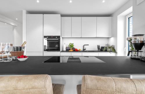 Kappeln Apartamento | Ferienwohnung Nordglanz – Modernes Beachhouse-Flair im Herzen des OstseeResort Olpenitz