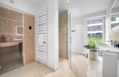 Kappeln Apartamento | Ferienwohnung Nordglanz – Modernes Beachhouse-Flair im Herzen des OstseeResort Olpenitz