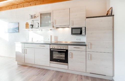 Tannenhausen Apartamento | Ferienwohnung Seepferdchen für 3 Personen am Badesee Tannenhausen