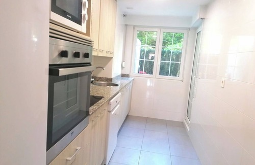 Arce Apartamento | Bajo con jardín La Mina equipado,playas.