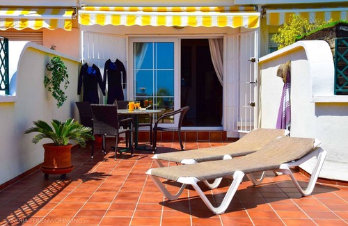 Nerja Apartamento | First line of beach, comfortable apartment overlooking Playa Burriana bay