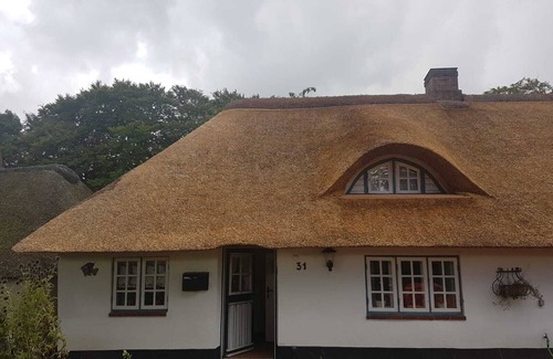 Leck Apartamento | Fischerhuus Leck: Cozy vacation apartment for 2 people under thatch.