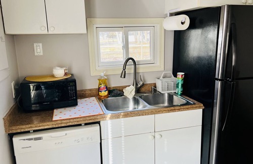 Algonac Cabaña | Fisherman's Cottage with lake access and dock private parking