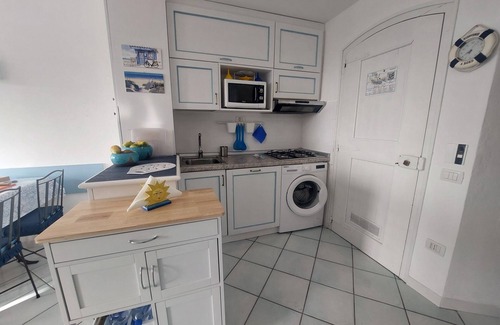 Canneddi Apartamento | Flat with sea view terrace in holiday village near Isola Rossa