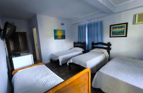 Conservatoria Apartamento | Flat e suítes com deque, cozinha e churrasqueira