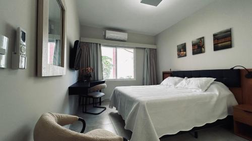 Ribeirao Preto Apartamento | Flat em Hotel com piscina, garagem, Wi-fi e Limpeza diária