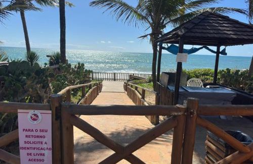 Jenipabu Apartamento | Flat Guarajuba - 3 quartos 2 andar à Beira Mar - pé areia - governança com arrumadeira e Wi Fi inclusos
