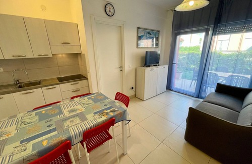 Porto Santa Margherita Apartamento | Piso con jardín privado junto al mar