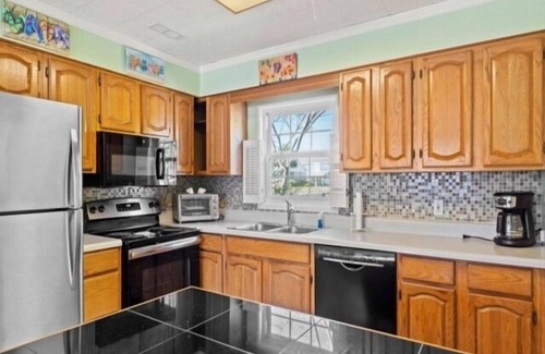 Kure Beach Cabaña | Flip Flop Paradise (2-Bedroom Cottage) by RedAwning
