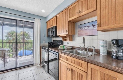 Holmes Beach Casa | Flip Floppin' at Sandy Pointe by Coastal Chic Vacations