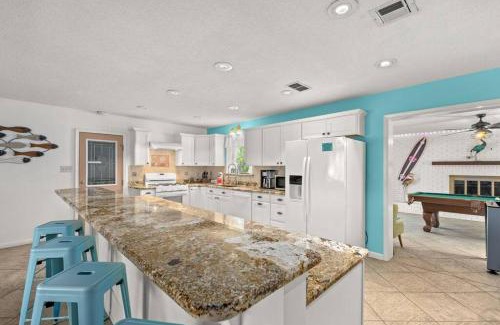 Upper Grand Lagoon Casa | Flirty Flamingo with Private Heated Pool, Game Room, and AMAZING Covered Outdoor Living