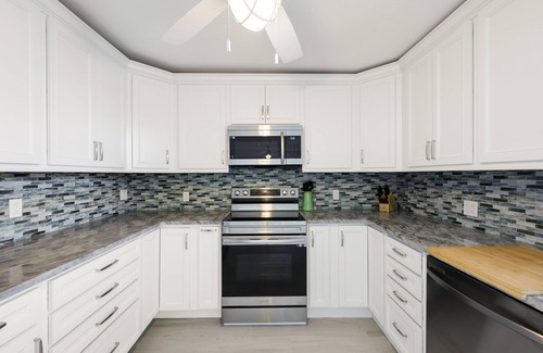 Biggar Villa | Florida Style Villa by the Water with heated Pool, Dock, Gulf access! Kayaks!