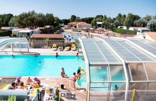 Chateau-d'Olonne Chalet De Esquí | Flower Camping Le Petit Paris **** - Standard chalet 30m2 - 2 bedrooms + covered terrace + TV 5 persons