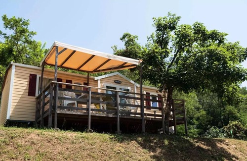 Les Ollieres-sur-Eyrieux Casa | Flower Camping Mas de Champel **** - Mobile-Home 30m2 - Comfort - 2 bedrooms - Terrace semi-covered - TV - Clim 5 persons