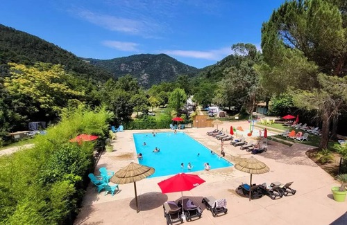 Michard West Casa | Flower Camping Mas de Champel **** - Mobile-Home 30m2 - Standard - 2 bedrooms - semi-covered terrace - TV - Clim 4 people