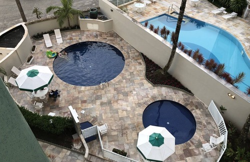 Riviera de Sao Lourenco Apartamento | Pie en la arena, vista al mar y mucho encanto