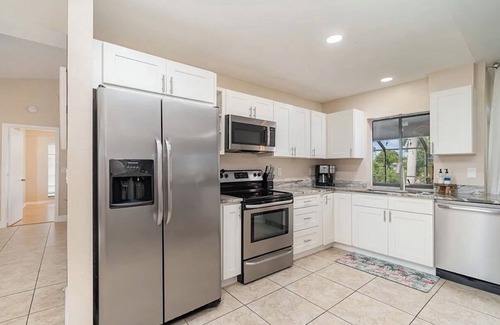 Pelican Casa | Four bedrooms, salt water pool, canal access with kayaks
