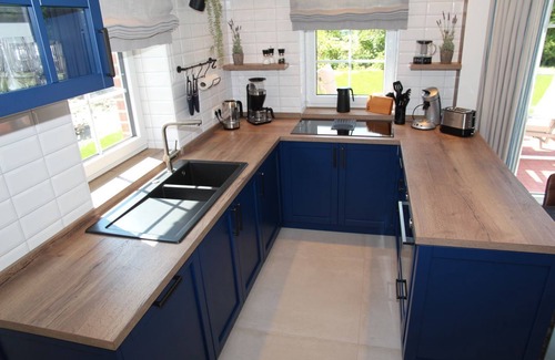 Eilsum Casa | Framheim - 100qm Luxus-ferienhaus für 7 Personen Direkt am Wasser bei Greetsiel!