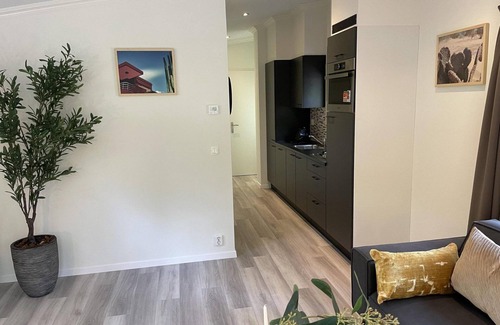 Terwolde Casa | Freestanding chalet for four persons, fully furnished. Located at the water.