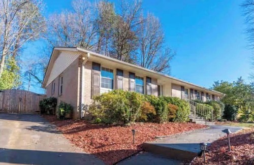 Greensboro Casa | Freshly renovated four bedroom home with a Beautiful backyard and pond.