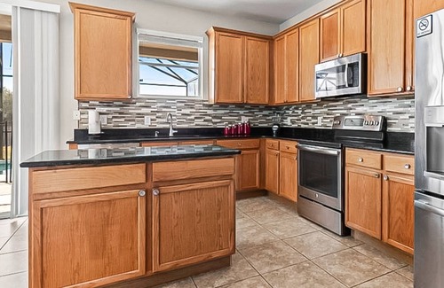 Trafalgar Village Casa | Freshly updated resort home with private pool, grill, soaking tubs, & smart TVs