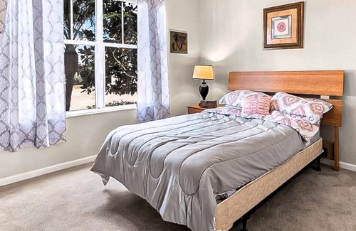 Trafalgar Village Casa | Freshly updated resort home with private pool, grill, soaking tubs, & smart TVs