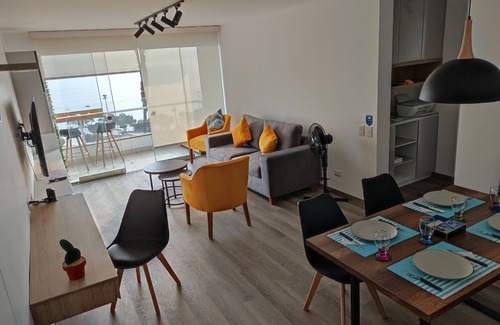 Santa Cruz Apartamento | Moderno apartamento con vista al mar, bien equipado, ideal para estadías largas.