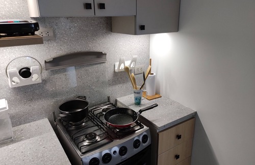 Santa Cruz Apartamento | Moderno apartamento con vista al mar, bien equipado, ideal para estadías largas.