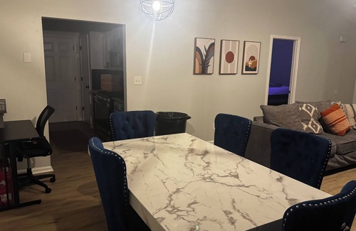 Church Street Casa | Fully Furnished Modern Home Patio with BBQ Grill for Relaxed Outdoor Living
