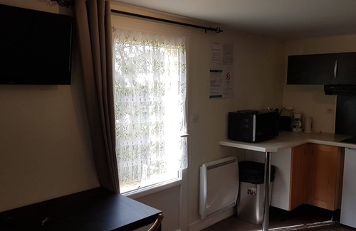 Bagnoles-de-l'Orne Apartamento | estudio amueblado en casa unifamiliar confortable con jardín maduro