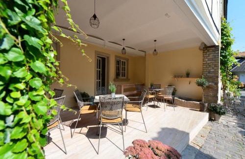 Weisenheim am Sand Casa | Gästehaus & Weingut GEHRIG