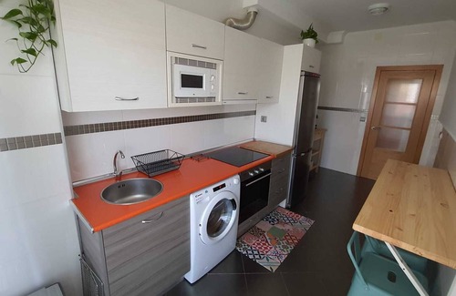 Suances Apartamento | El bajo/jardin de Gabriela