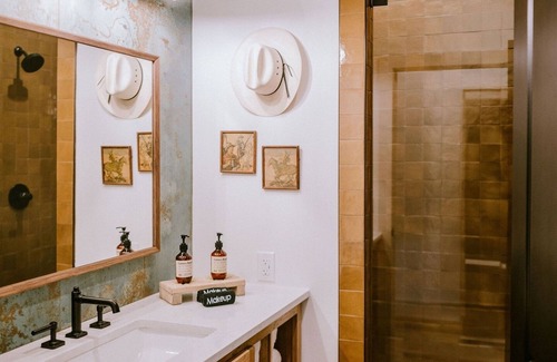 Wimberley Hotel | Gaines Ranch on the Square | The Corral Suite | 2 Queens | Downtown Wimberley