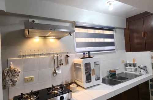 Puerto Galera Apartamento | Garden and pool view apartment