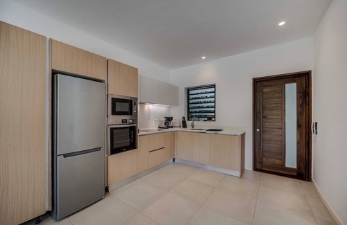 Pointe aux Canonniers Apartamento | Garden apartment - near the beach -