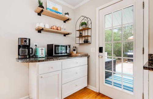 Santa Rosa Beach Cabaña | Garden cottage close to beach with screened porch, WiFi, and central AC