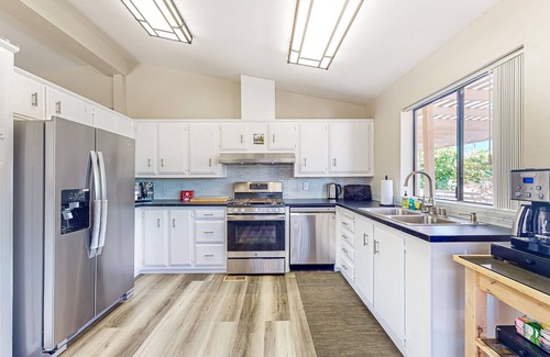 Palm Desert Casa | Gated community home with 2 pools, hot tubs, private patio, AC, & W/D