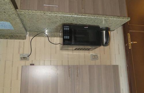 New Cairo Apartamento | Gazzar inn: Rehab9 Apartamento moderno con vista al jardín.