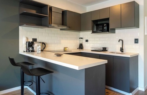 San Isidro Apartamento | geko| Arcade Loft apt in top business hub