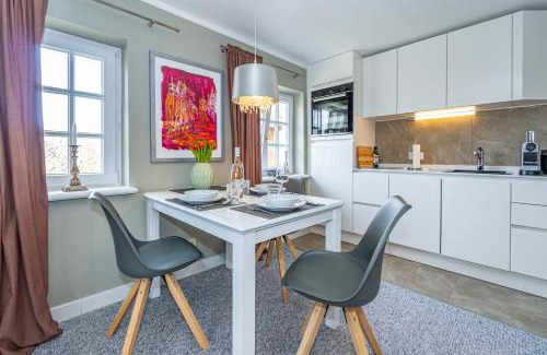Keitum Apartamento | Gemütliche Wohnung unter Reet mit Pool und Sauna in Keitum