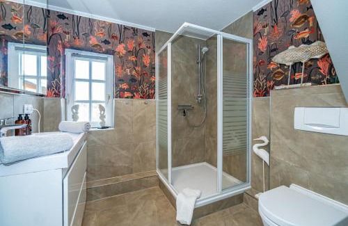 Keitum Apartamento | Gemütliche Wohnung unter Reet mit Pool und Sauna in Keitum