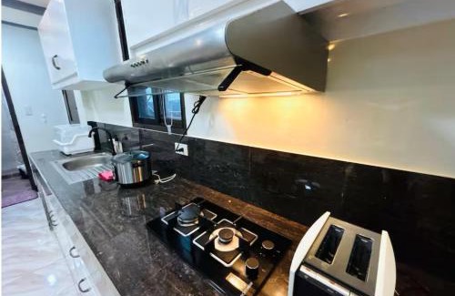 Catangnan Villa | General Luna Villa with kitchen, wifi and parking