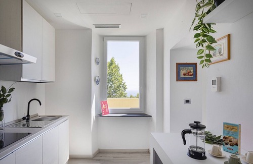 Castelletto Apartamento | Genova Skyline with Terrace by Wonderful Italy