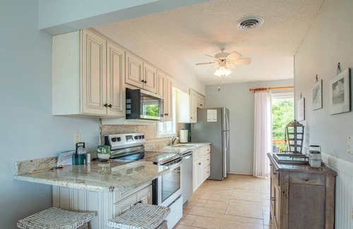 Sea Acres Casa | Georgetown Sands condo with WiFi, outdoor shower, and access to community pool and tennis