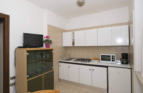 Frader Apartamento | Gianni with 2 bedrooms, in the ground floor with garden and lake view