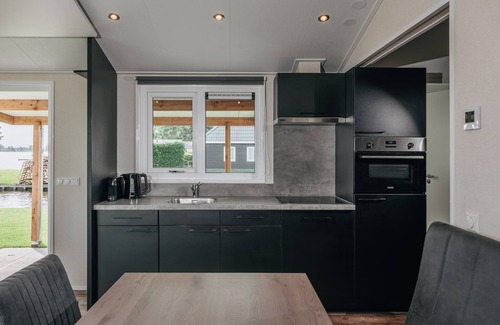 Zuideinde Chalet De Esquí | Accogliente chalet con aria condizionata e sloop